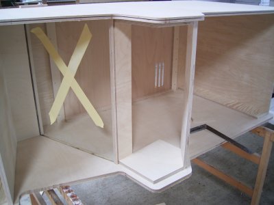 support for control panel mounted to the cabinet