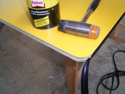 Glueing the t-molding to the cabinet sides